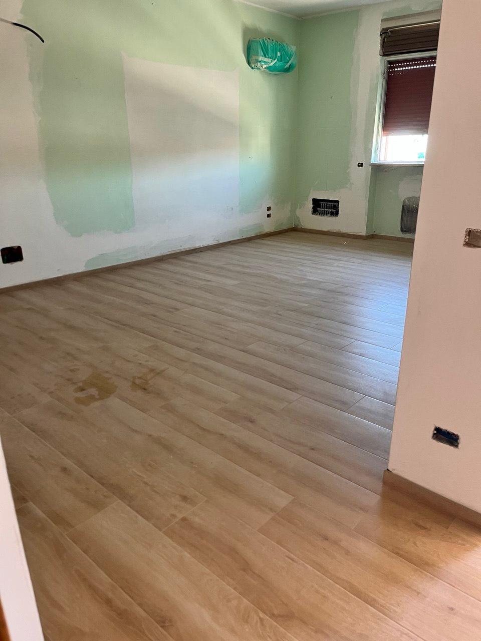 Dark SPC Flooring with Integrated Cork Underlayment